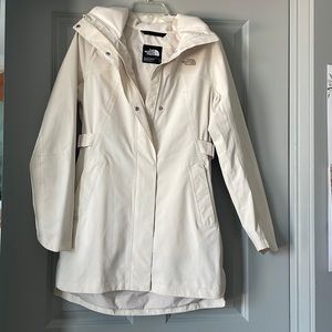 North Face rain jacket. Worn once. Zipper and button up front. 2 Front pockets.